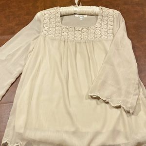 Brand New top with pearl embellishments and scallop hem.